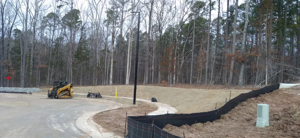Berm and drainage system, wide view of the graded site