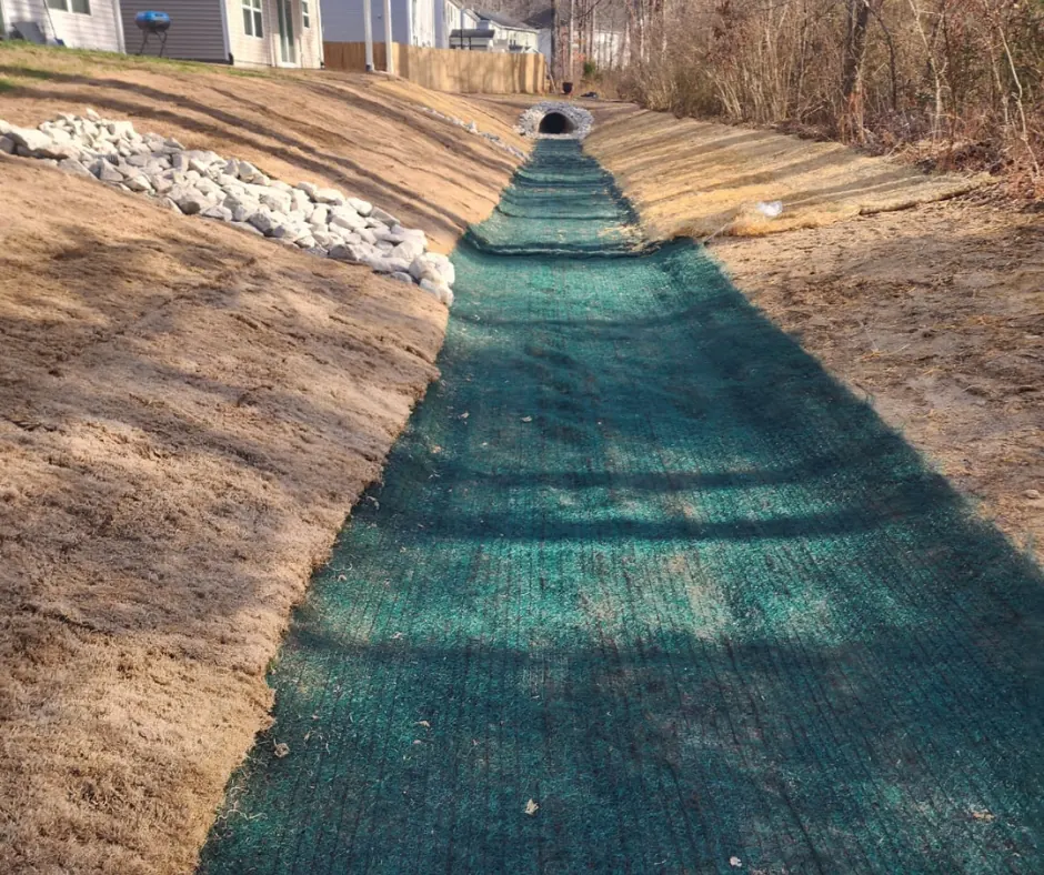 Erosion control matting on a channel